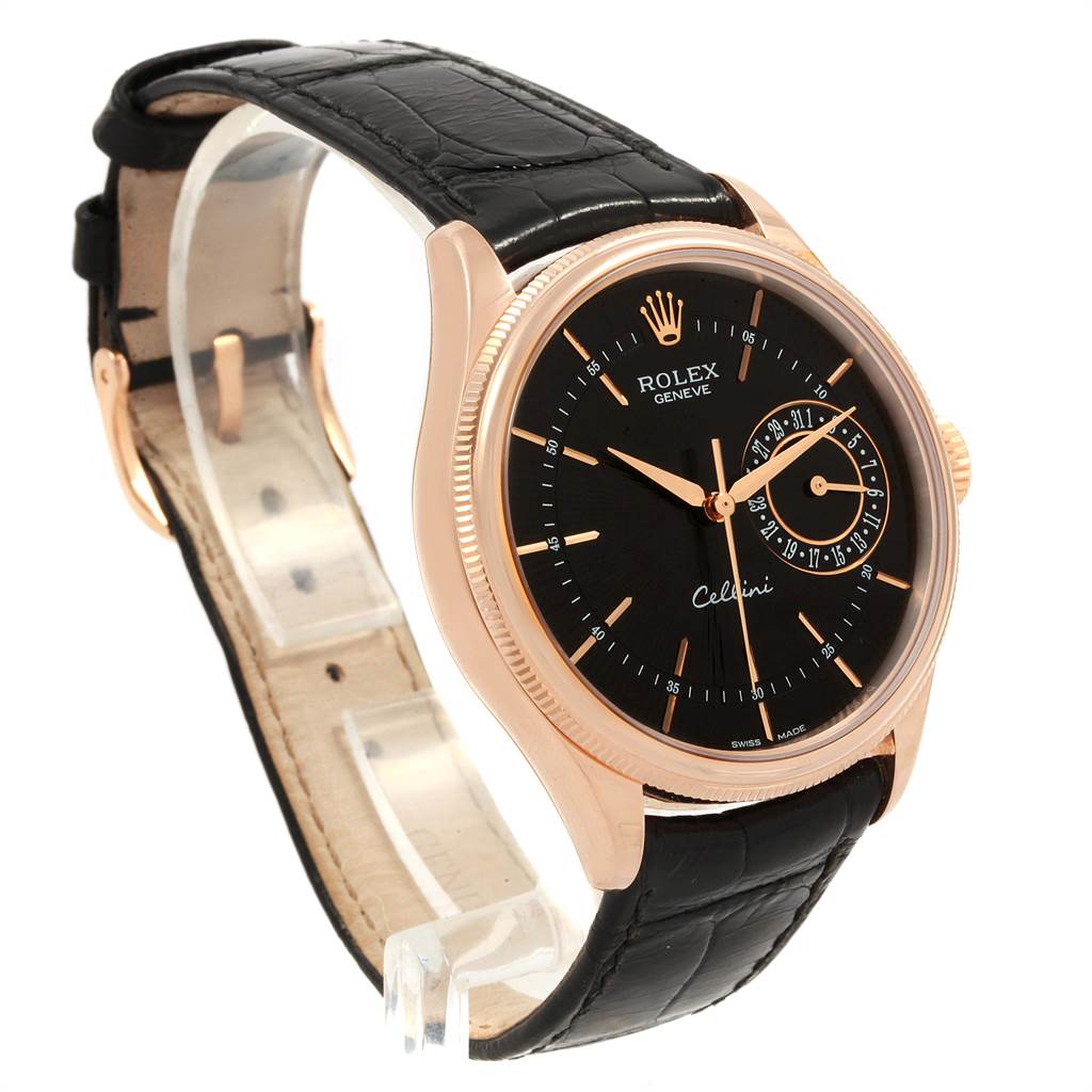 The image shows a Rolex Cellini 50515 Men
s Rose Gold Black Dial 50515 Men
s Rose Gold Black Dial watch at a side angle, displaying its black dial, rose gold case, and black leather strap.