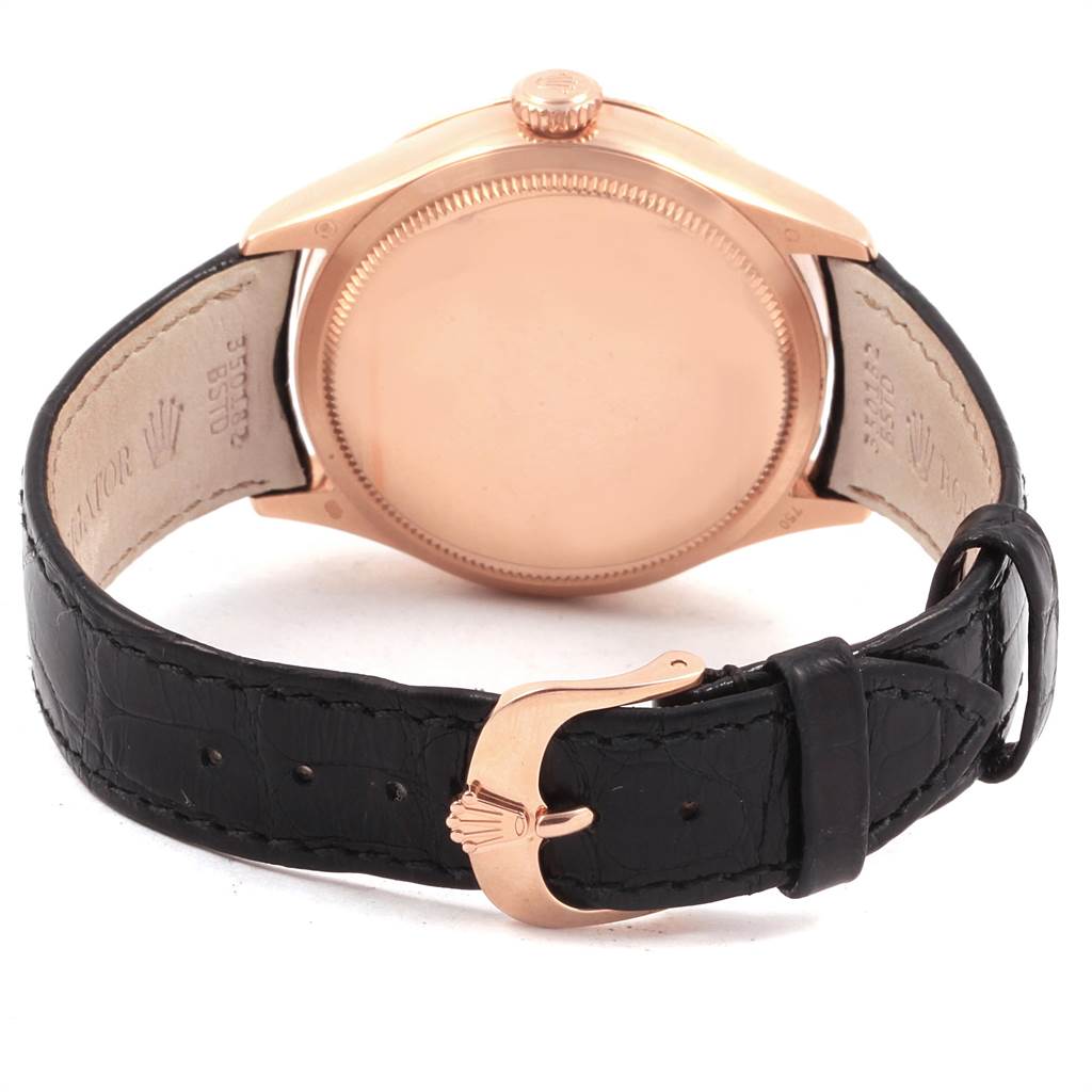 The image shows the back case and leather strap of a Rolex Cellini 50515 Men
s Rose Gold Black Dial 50515 Men
s Rose Gold Black Dial watch, highlighting the buckle and crown.