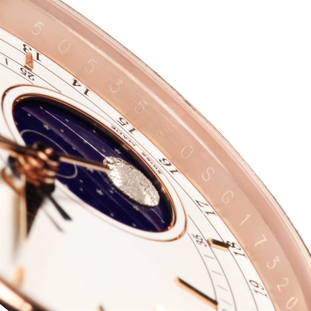 The image shows a close-up angle of the Rolex Cellini 50525 Men's Rose Gold White Dial 50525 Men's Rose Gold White Dial watch face, featuring part of the bezel, the moon phase indicator, and the date scale.