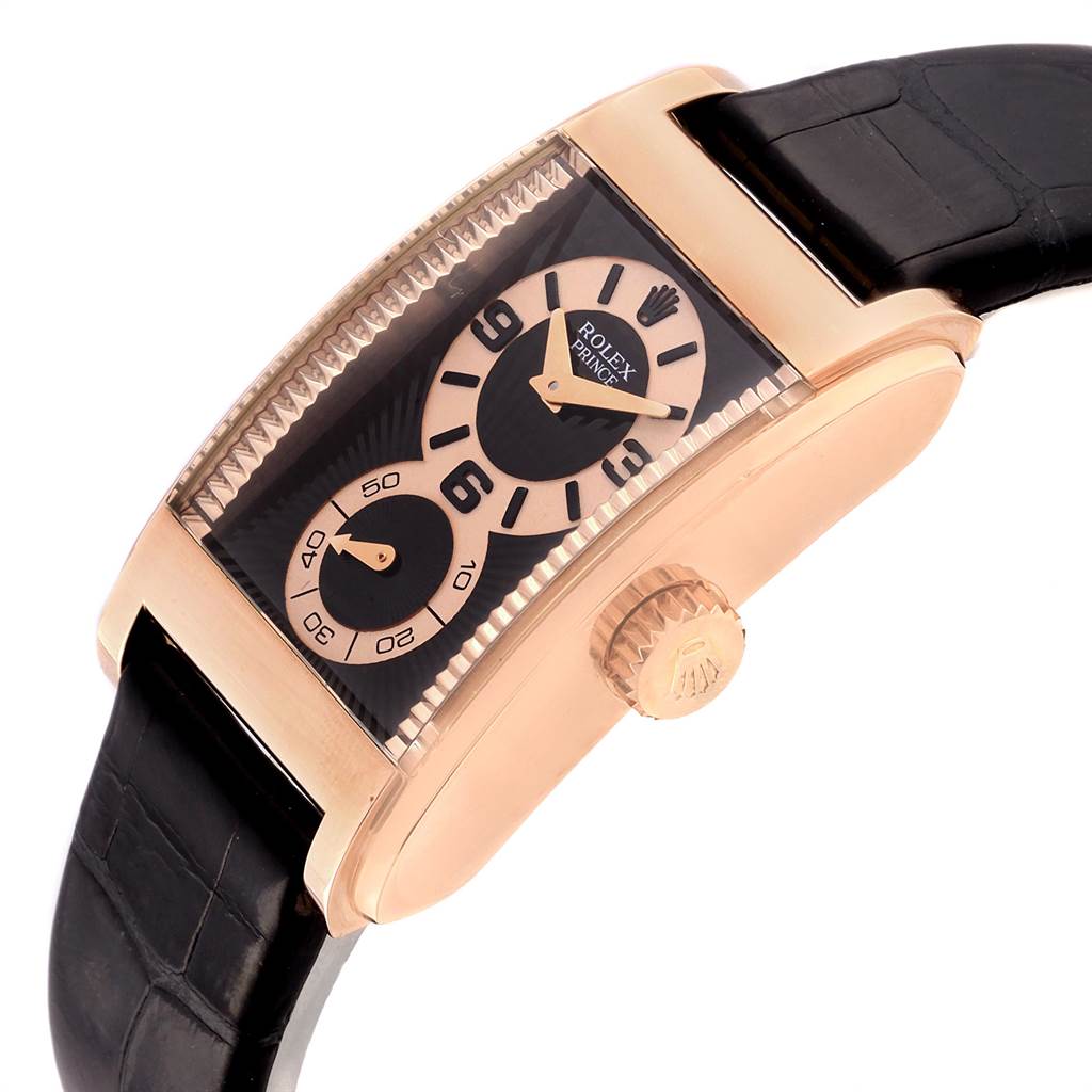 The image shows a partial front and side view of a Rolex Cellini 5442/5 Men's Rose Gold Black Dial 5442/5 Men's Rose Gold Black Dial Prince watch, highlighting its dial, crown, and leather strap.