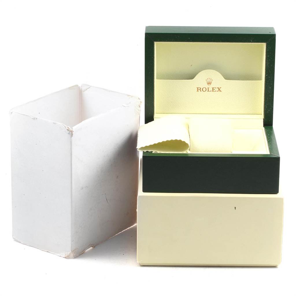 This image shows an open Rolex Cellini 5442/5 Men's Rose Gold Black Dial 5442/5 Men's Rose Gold Black Dial watch box and a cleaning cloth, along with an outer protective box.