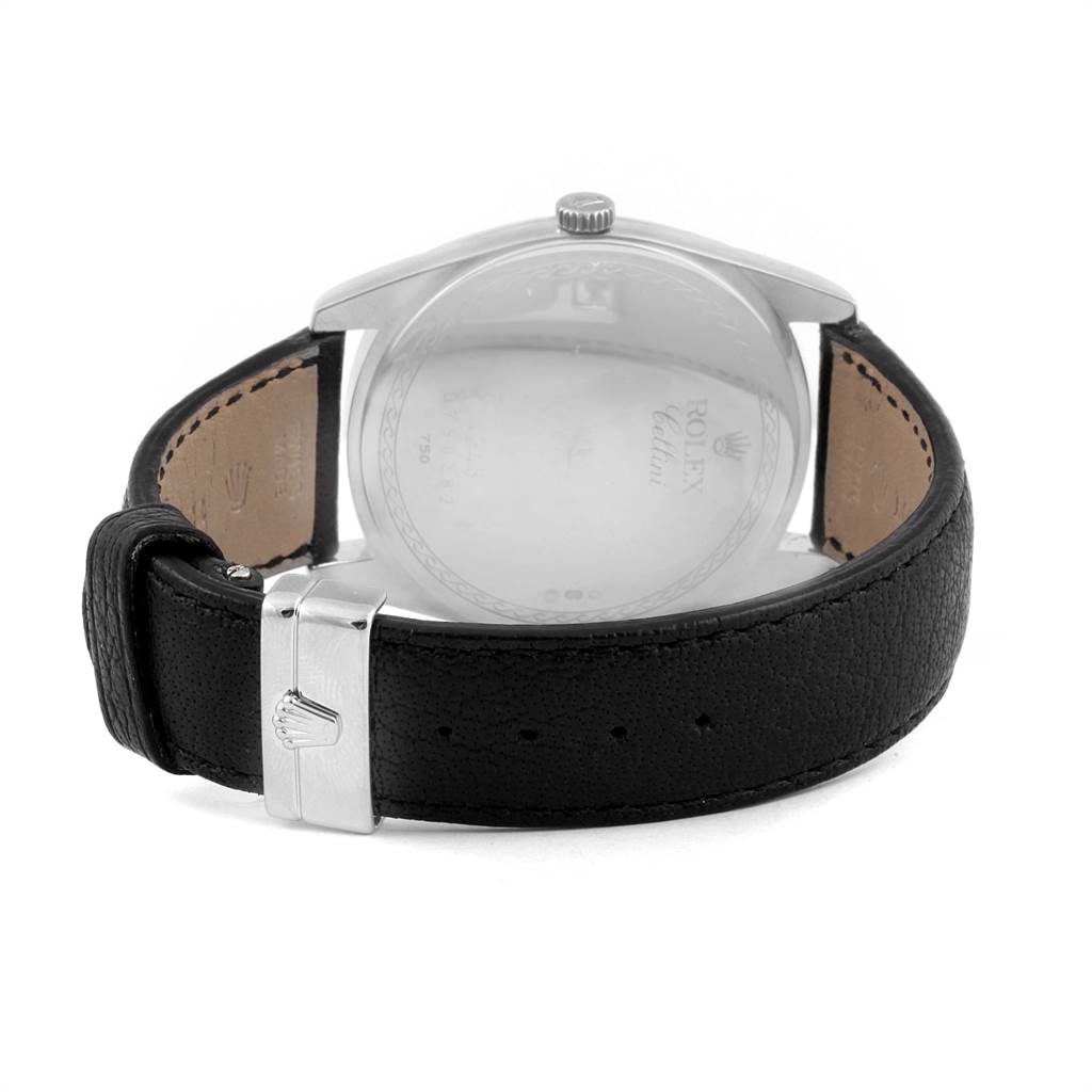 This image shows a Rolex Cellini 4243 Men's White Gold Black Dial 4243 Men's White Gold Black Dial watch from the back, highlighting its black leather strap and buckle.