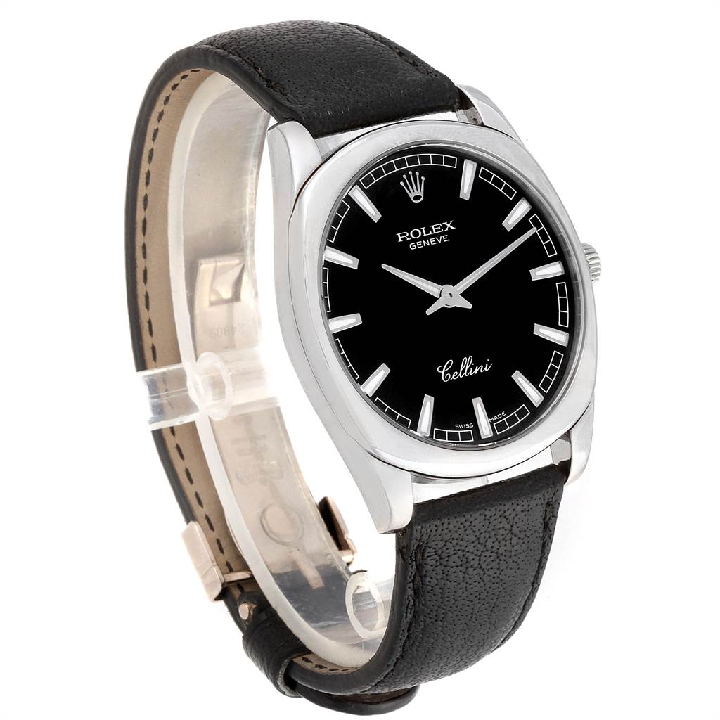 The image shows a Rolex Cellini 4243 Men's White Gold Black Dial 4243 Men's White Gold Black Dial watch at a three-quarter angle, highlighting the face, bezel, crown, and leather strap.