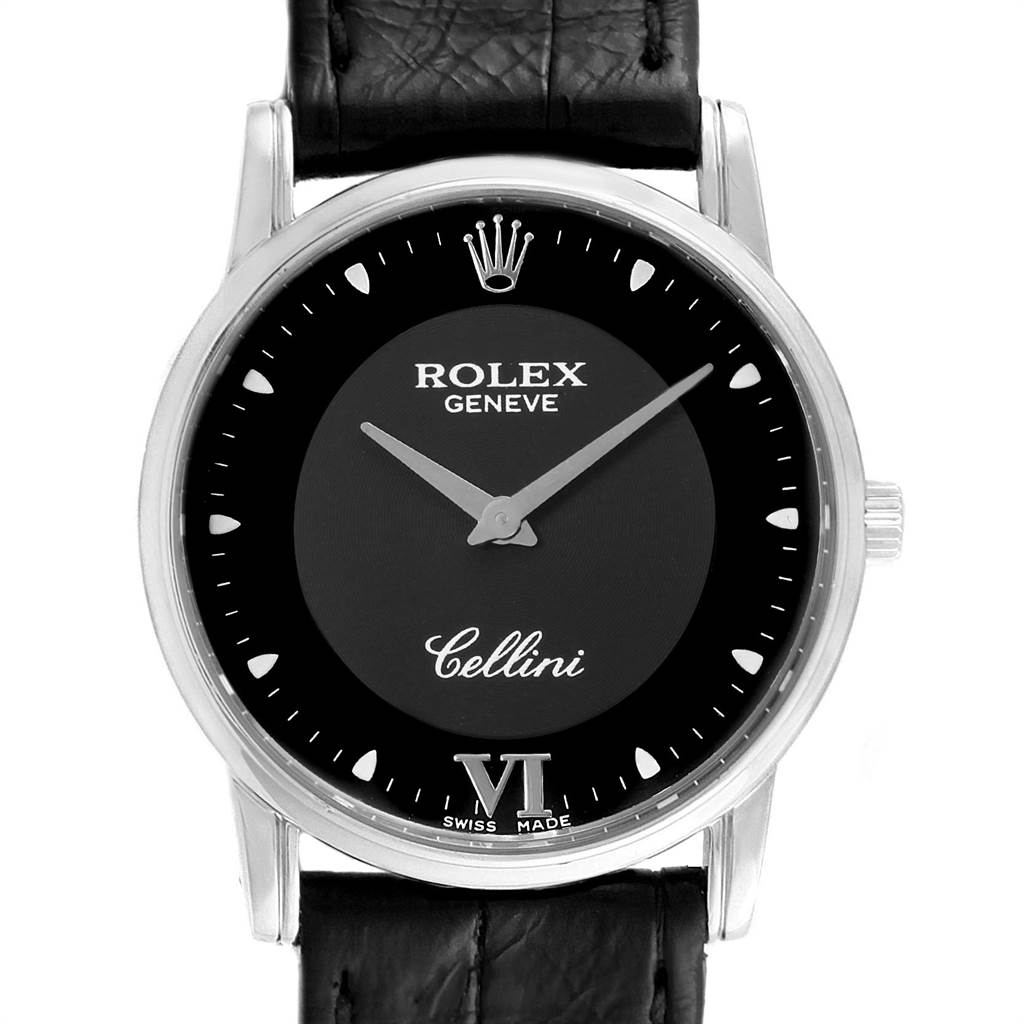 The image shows a front view of a Rolex Cellini 5116 Men's White Gold Black Dial 5116 Men's White Gold Black Dial watch, including the dial, crown, and part of the strap.