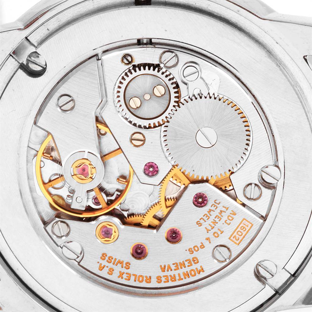 This is a close-up view of the movement and internal gears of a Rolex Cellini 5116 Men's White Gold Black Dial 5116 Men's White Gold Black Dial watch.