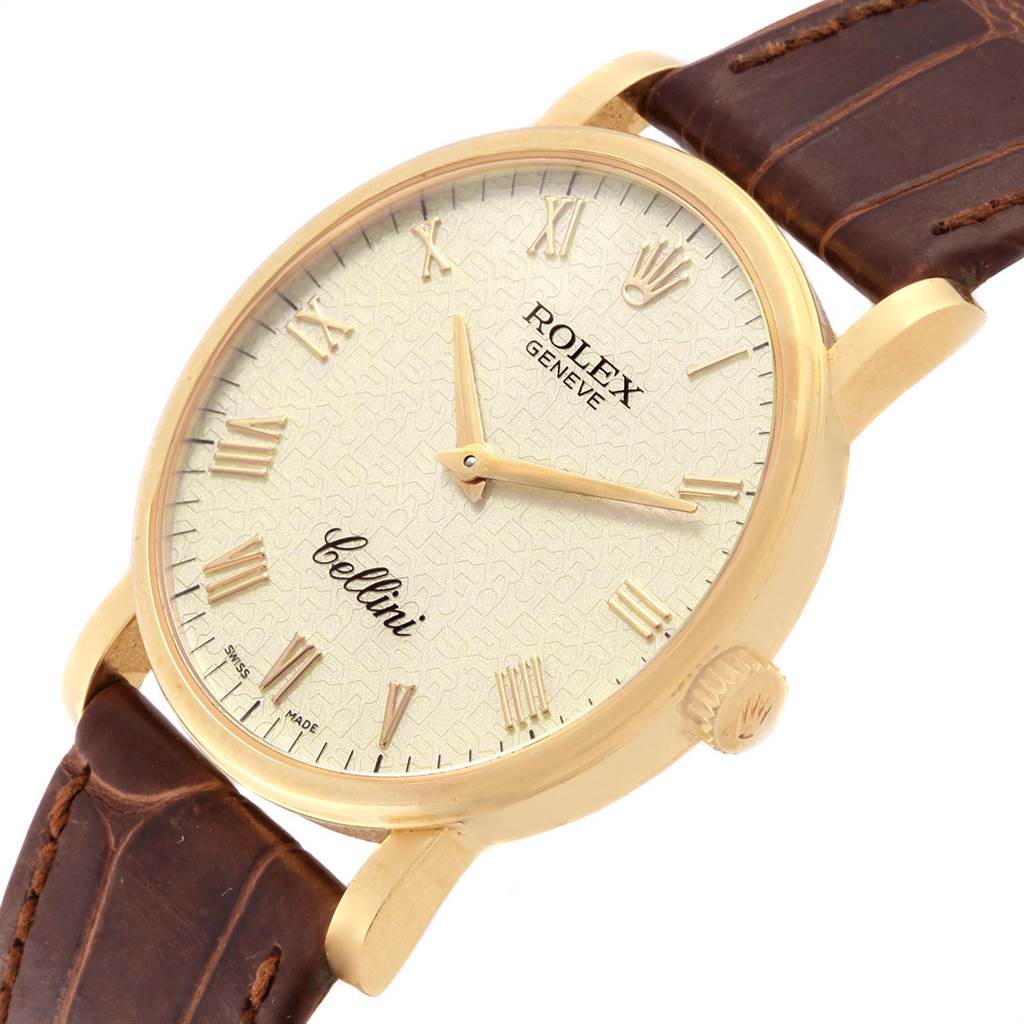The image shows a Rolex Cellini 5115 Men's Yellow Gold Beige Dial 5115 Men's Yellow Gold Beige Dial watch at a slightly angled view, highlighting its face, hands, crown, and brown leather strap.