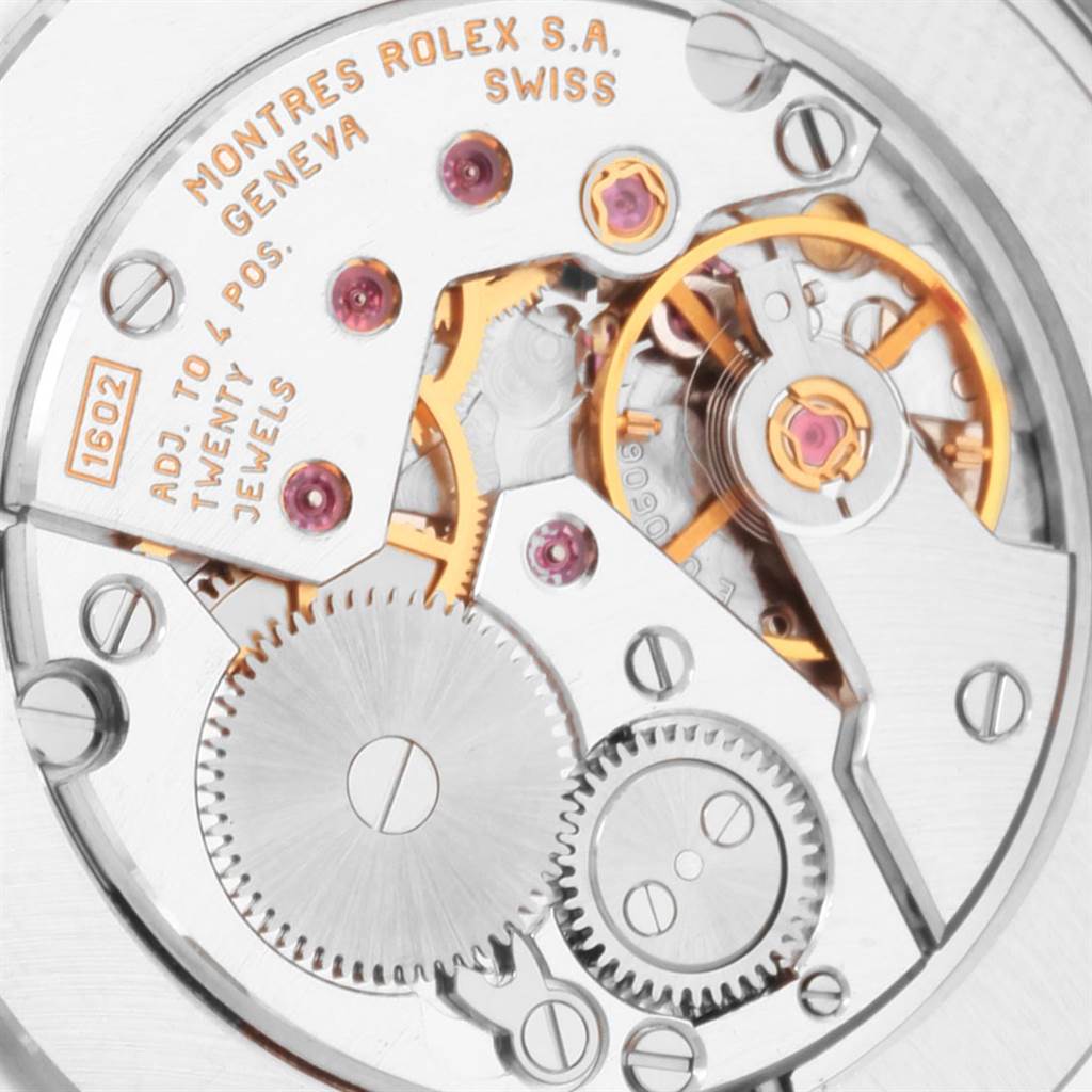 This image shows a detailed view of the movement and components of a Rolex Cellini 5115 Men's Yellow Gold Champagne Dial 5115 Men's Yellow Gold Champagne Dial watch.