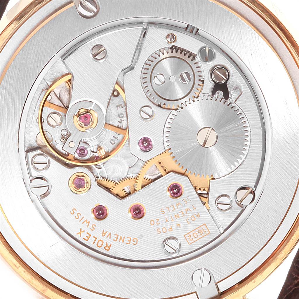 This image shows the internal mechanism and gears of the Rolex Cellini 5115 Men's Yellow Gold Beige Dial 5115 Men's Yellow Gold Beige Dial model's movement from a close-up, top-down angle.
