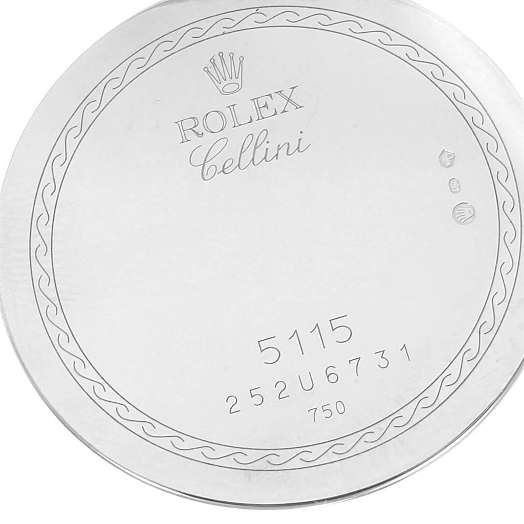 The image shows the engraved back case of a Rolex Cellini 5115 Men
s White Gold Silver Dial 5115 Men
s White Gold Silver Dial model watch, displaying the brand name, model number, and some additional markings.