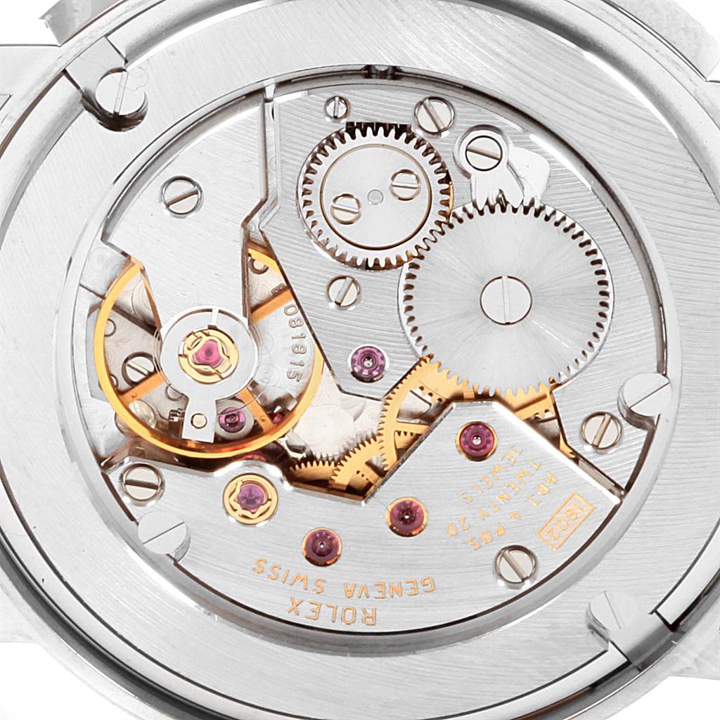 This image shows the intricate internal movement mechanism of a Rolex Cellini 5115 Men
s White Gold Silver Dial 5115 Men
s White Gold Silver Dial watch from a top-down angle.