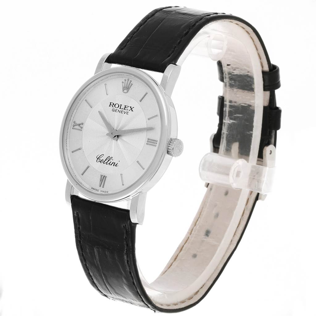 The Rolex Cellini 5115 Men
s White Gold Silver Dial 5115 Men
s White Gold Silver Dial watch is displayed at a slight angle, showing the face, crown, and its black leather strap.