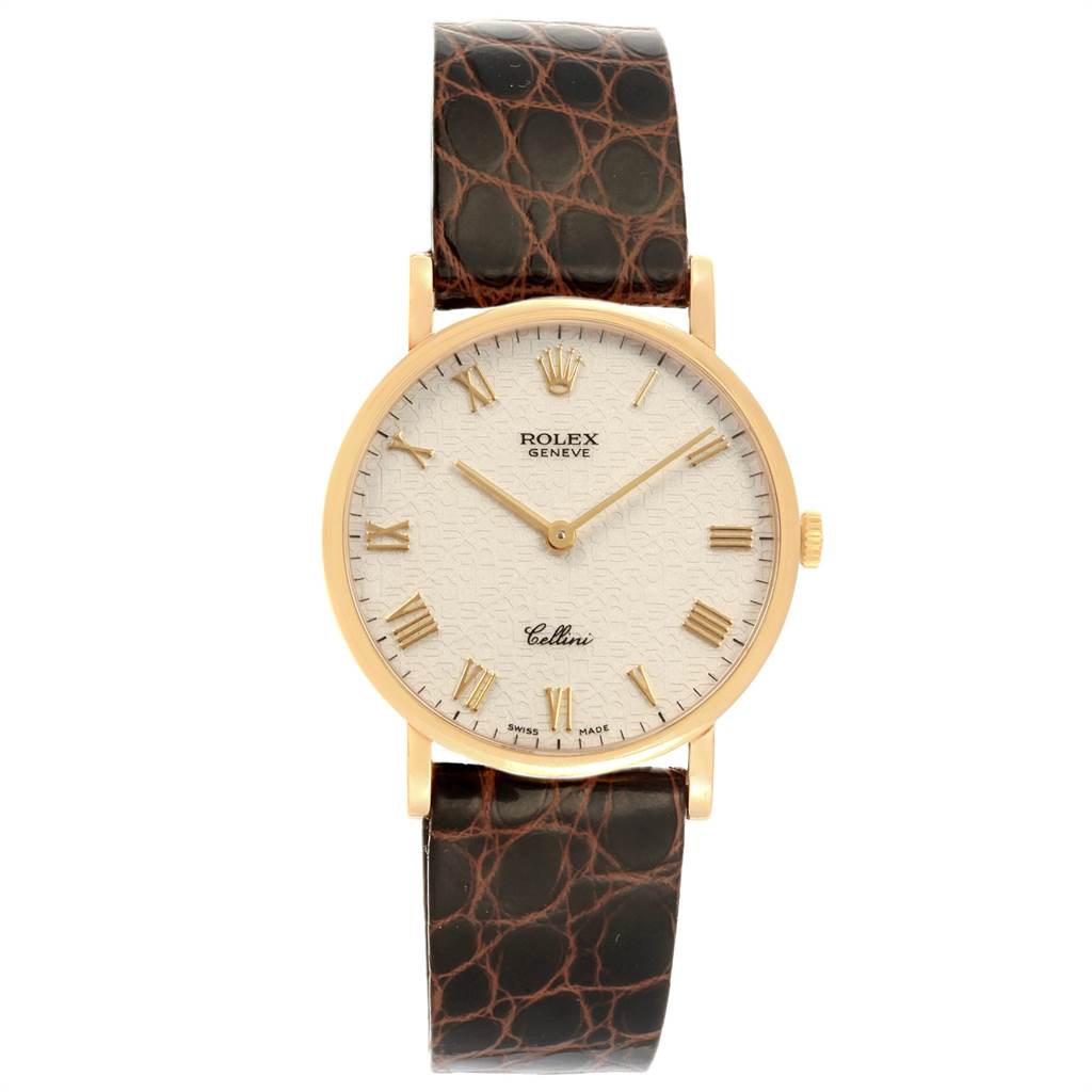 The Rolex Cellini 5112 Men's Yellow Gold Beige Dial 5112 Men's Yellow Gold Beige Dial watch is shown from a front view, featuring its dial, hands, and leather strap.
