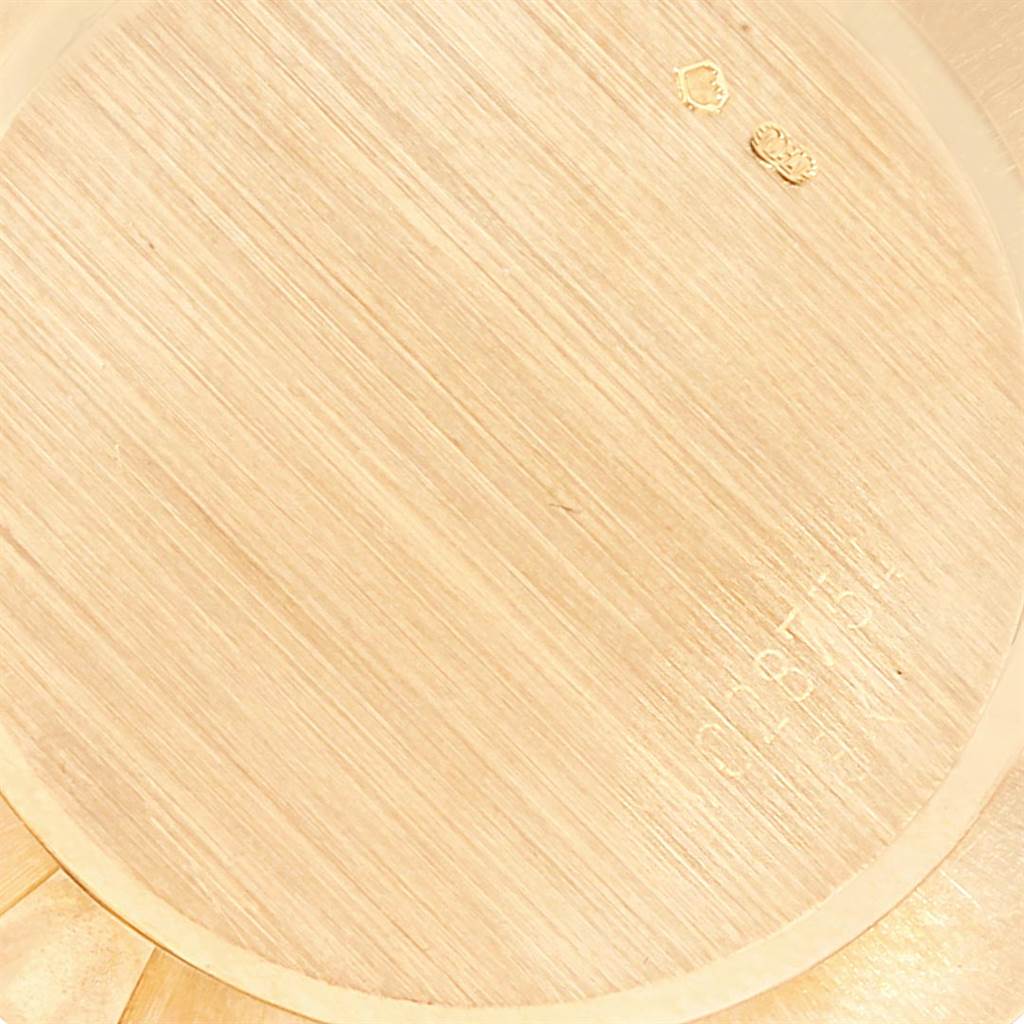 The image displays the case back of a Rolex Cellini 5112 Men's Yellow Gold Beige Dial 5112 Men's Yellow Gold Beige Dial model watch, viewed from a close-up angle.