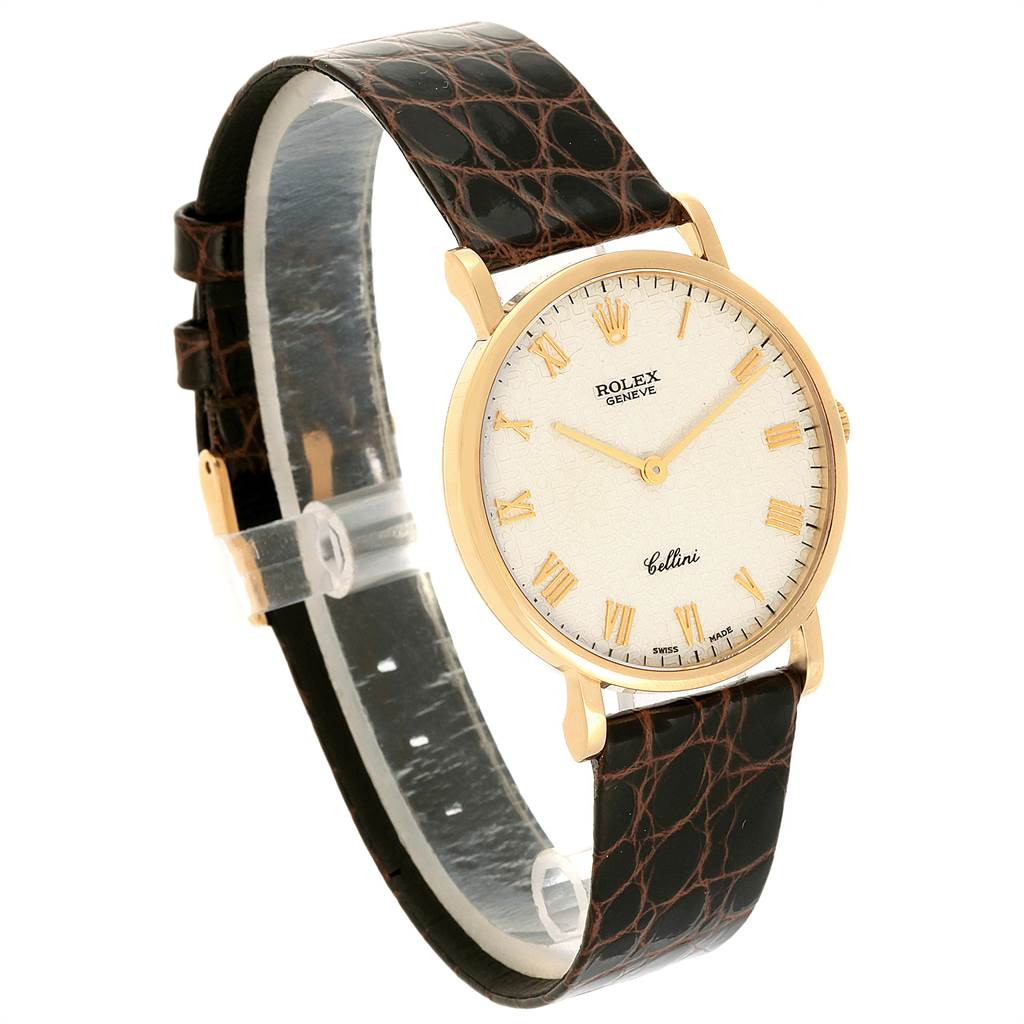 The Rolex Cellini 5112 Men's Yellow Gold Beige Dial 5112 Men's Yellow Gold Beige Dial watch is shown at a three-quarter angle, highlighting its face, strap, and side.