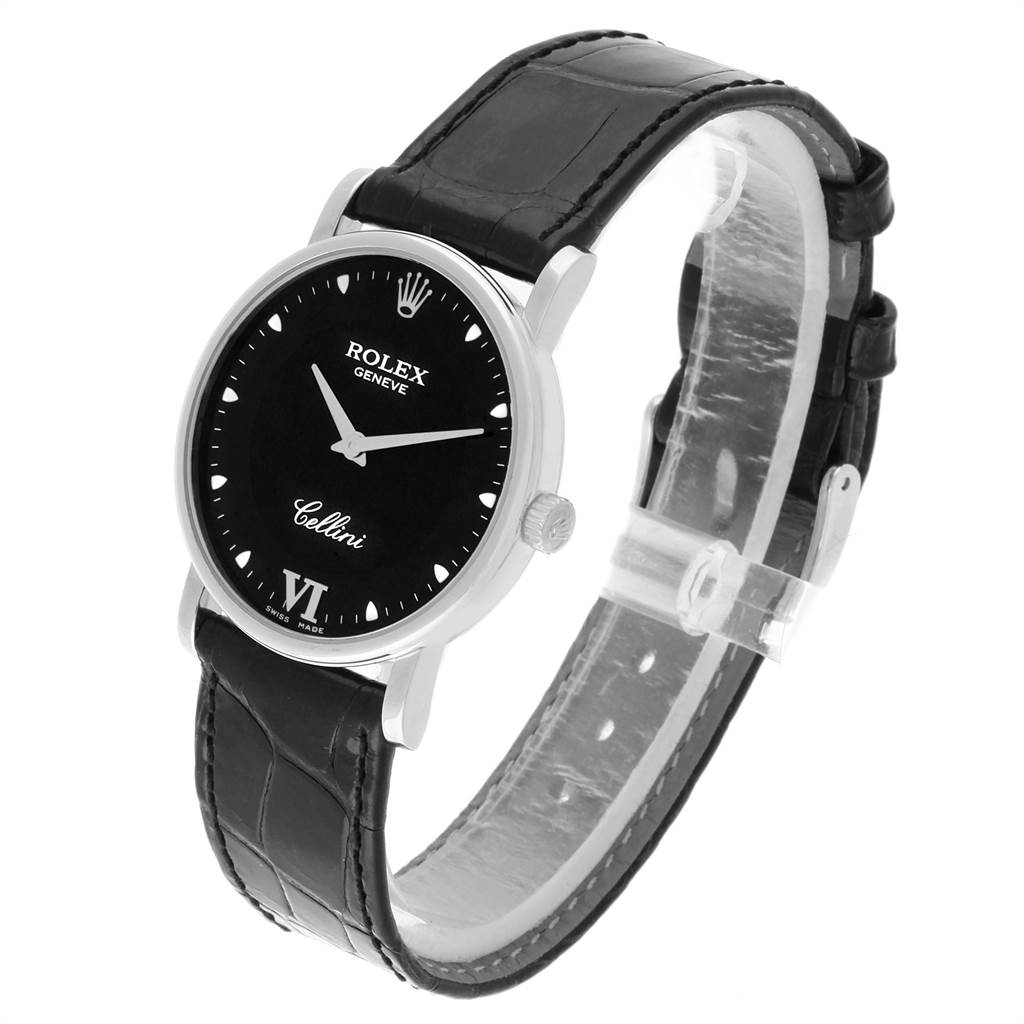 The Rolex Cellini 5115 Men
s White Gold Black Dial 5115 Men
s White Gold Black Dial watch is shown at a slight angle, highlighting its face, bezel, crown, and leather strap.
