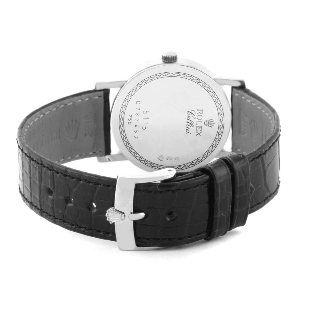 The image shows the back casing and leather strap of a Rolex Cellini 5115 Men
s White Gold Black Dial 5115 Men
s White Gold Black Dial watch.