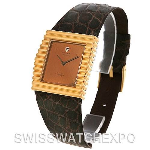 The Rolex Cellini 4015 Yellow Gold Brown Dial 4015 Yellow Gold Brown Dial watch is shown at an angle highlighting the front face, strap, and clasp.