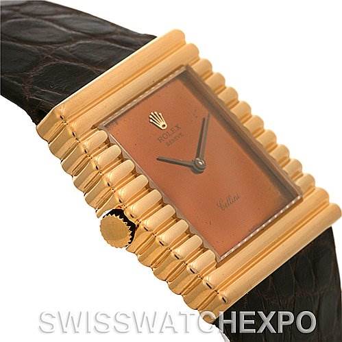 The image shows a close-up of a Rolex Cellini 4015 Yellow Gold Brown Dial 4015 Yellow Gold Brown Dial watch face, crown, and part of the strap at a slight angle.