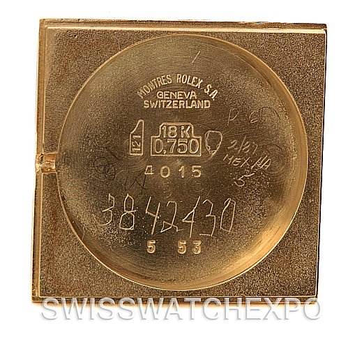 This image shows the inside case back of a Rolex Cellini 4015 Yellow Gold Brown Dial 4015 Yellow Gold Brown Dial watch, featuring engravings including the model and brand's hallmarks.