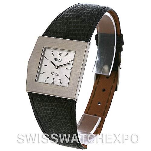 This image shows a Rolex Cellini 4017 White Gold Silver Dial 4017 White Gold Silver Dial watch from an angled side view, highlighting the square face, black leather strap, and part of the buckle.