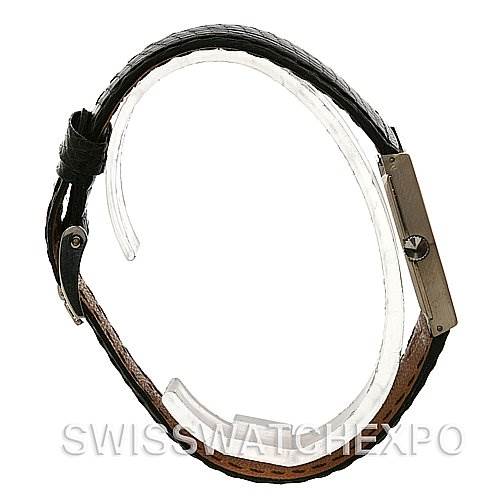 This image shows a side profile angle of a Rolex Cellini 4017 White Gold Silver Dial 4017 White Gold Silver Dial watch, highlighting its leather strap and slim case.