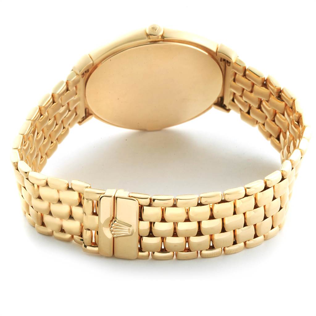 The image shows the back and clasp of a Rolex Cellini 6623 Men
s Yellow Gold Champagne Dial 6623 Men
s Yellow Gold Champagne Dial watch, highlighting its gold bracelet and smooth case back.