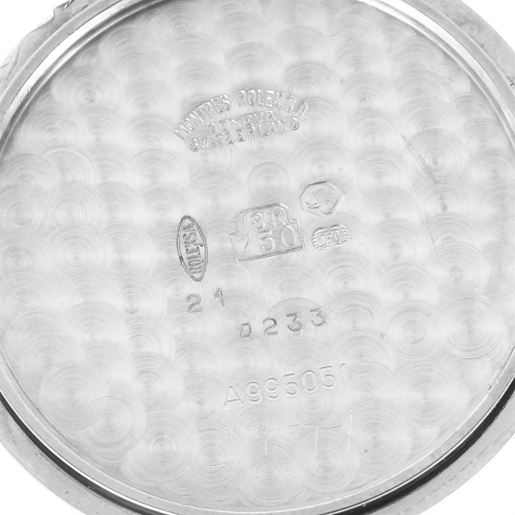 The image shows the inner case back of a Rolex Cellini 4233 Men
s White Gold White Dial 4233 Men
s White Gold White Dial watch, revealing hallmark stamps and serial numbers.