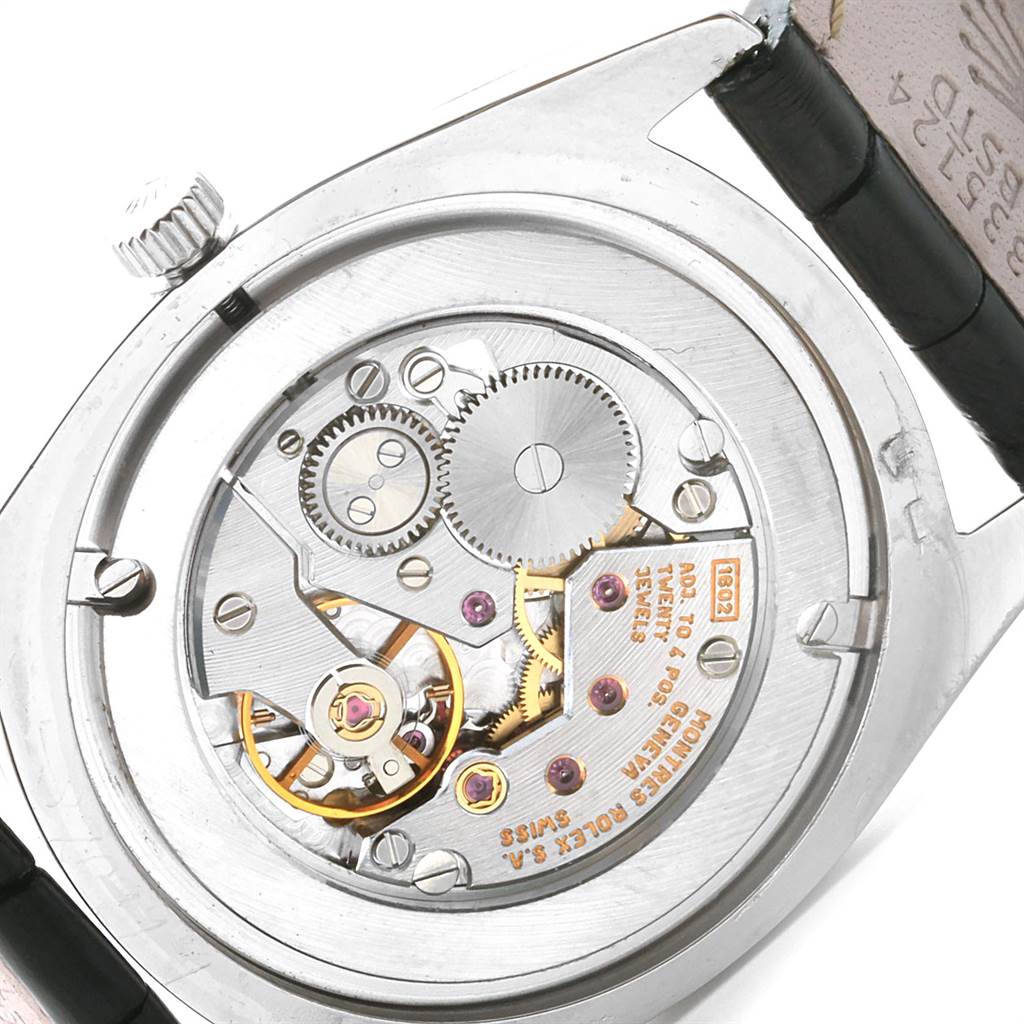 This image shows the back of the Rolex Cellini 4233 Men
s White Gold White Dial 4233 Men
s White Gold White Dial watch, highlighting its exposed mechanical movement.