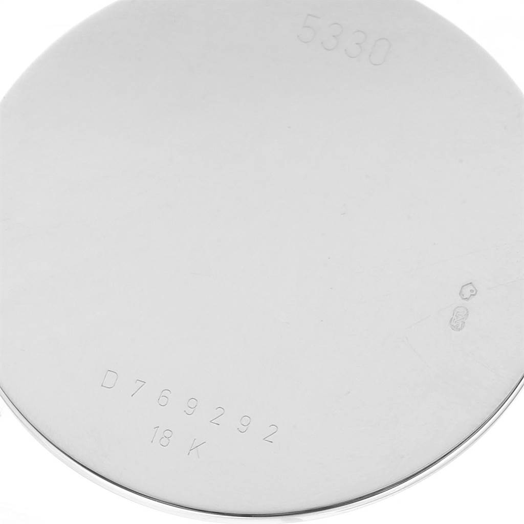 This image shows the back casing of a Rolex Cellini 5330 Men
s White Gold White Dial 5330 Men
s White Gold White Dial model watch, featuring engravings including the model number and 
18 K
.