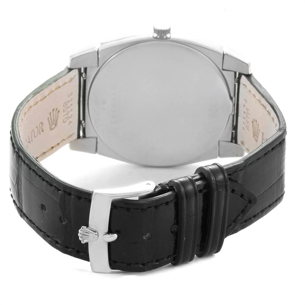 This image shows the back case and black leather strap of a Rolex Cellini 5330 Men
s White Gold White Dial 5330 Men
s White Gold White Dial watch from a rear angle.