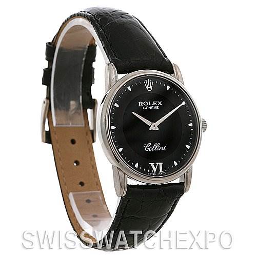 The Rolex Cellini 5116 White Gold Black Dial 5116 White Gold Black Dial watch is shown at a slight side angle, highlighting its black dial, silver case, and black leather strap.