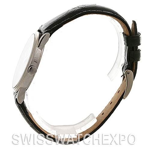 The image shows a side profile of a Rolex Cellini 5116 White Gold Black Dial 5116 White Gold Black Dial watch, highlighting the case, crown, and leather strap.