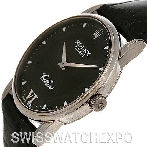 This image shows the Rolex Cellini 5116 White Gold Black Dial 5116 White Gold Black Dial watch at an angled close-up, highlighting the dial, watch crown, and part of the strap.