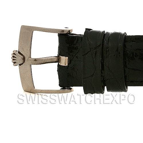 The image shows a close-up of a black leather strap with a buckle from the Rolex Cellini 5116 White Gold Black Dial 5116 White Gold Black Dial model.