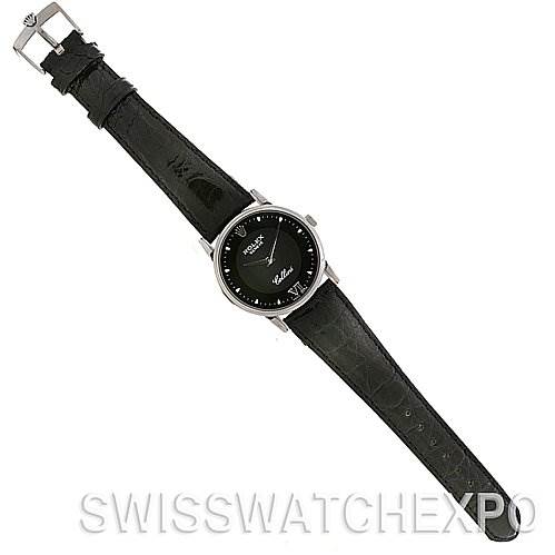 This image shows a top-down view of a Rolex Cellini 5116 White Gold Black Dial 5116 White Gold Black Dial watch displaying its black dial, case, and leather strap.