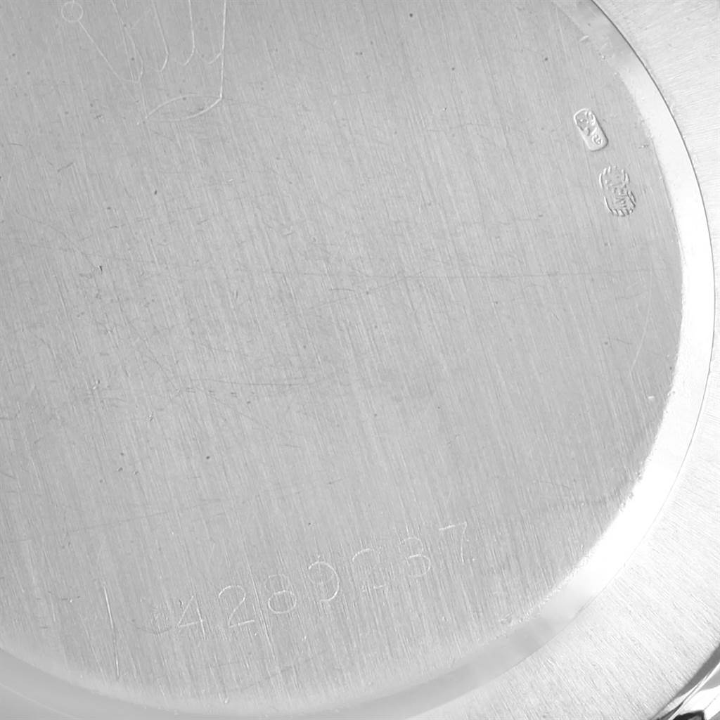 The image shows the back case of a Rolex Cellini 4112 Men
s White Gold Blue Dial 4112 Men
s White Gold Blue Dial watch at a close-up angle.