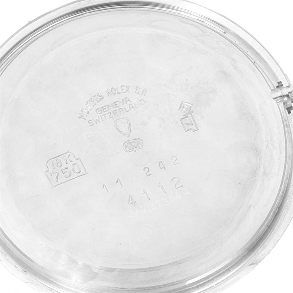 The image shows the inside of the case back of a Rolex Cellini 4112 Men
s White Gold Blue Dial 4112 Men
s White Gold Blue Dial watch.