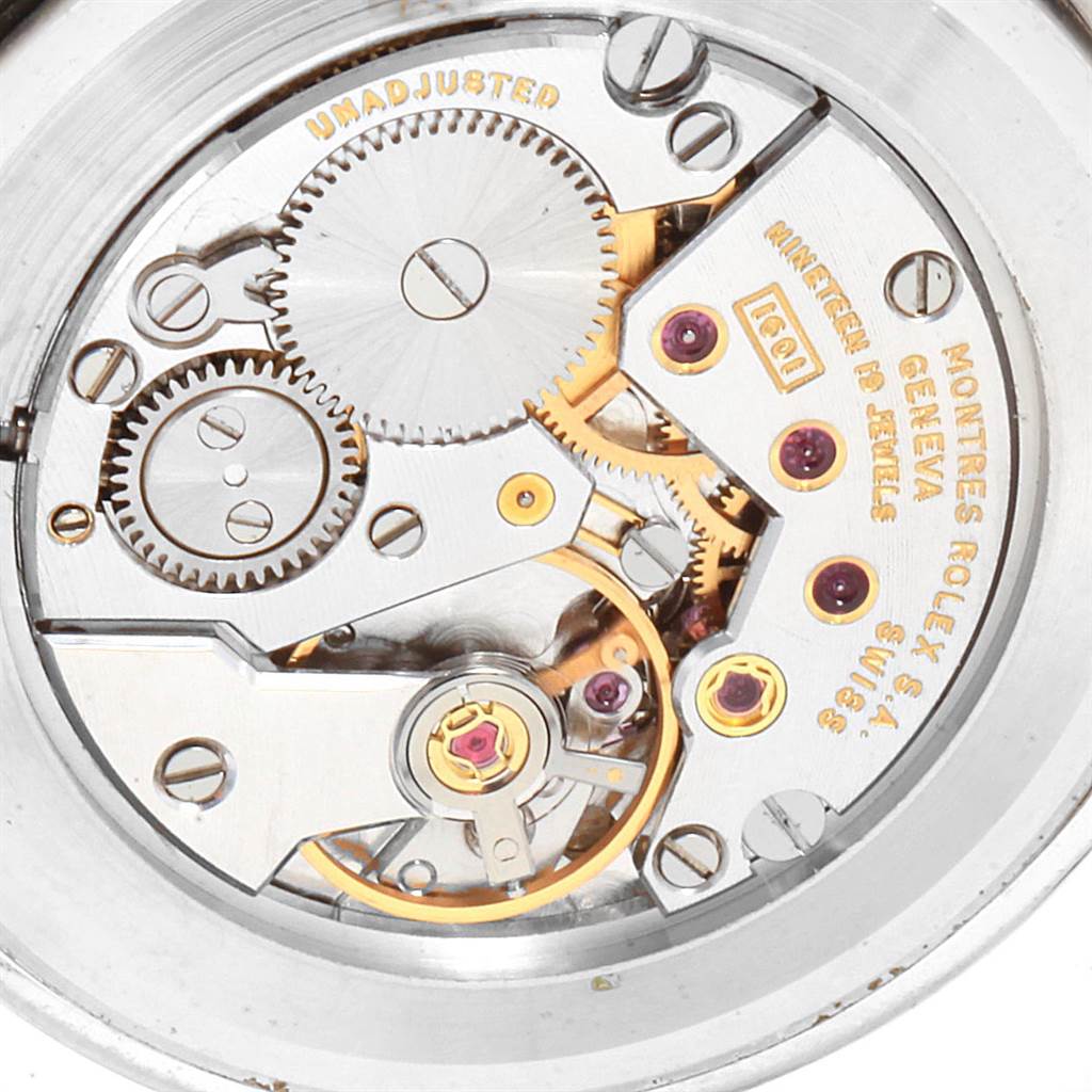 This is a close-up view of the movement mechanism of a Rolex Cellini 4112 Men
s White Gold Blue Dial 4112 Men
s White Gold Blue Dial watch.