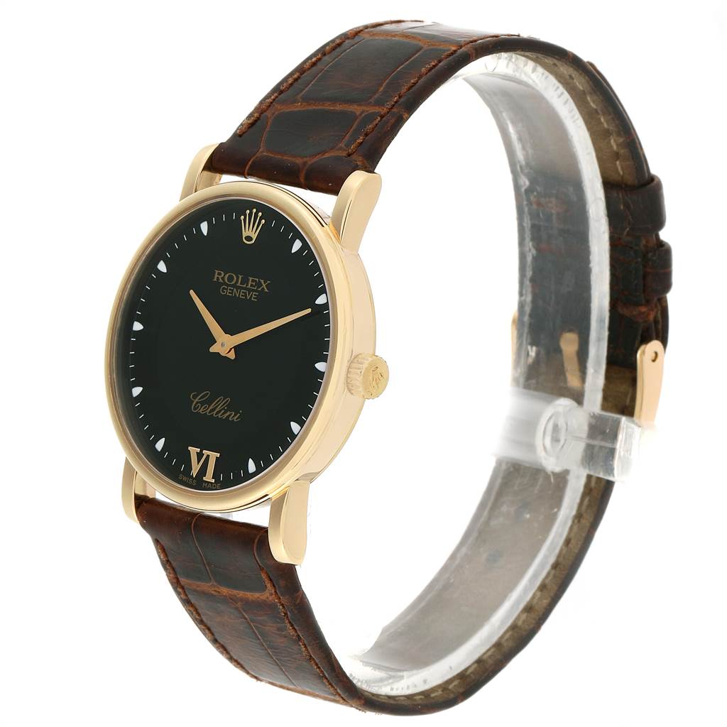 The image shows a Rolex Cellini 5115 Men's Yellow Gold Black Dial 5115 Men's Yellow Gold Black Dial watch at a slight angle, highlighting its bezel, dial, crown, and leather strap.