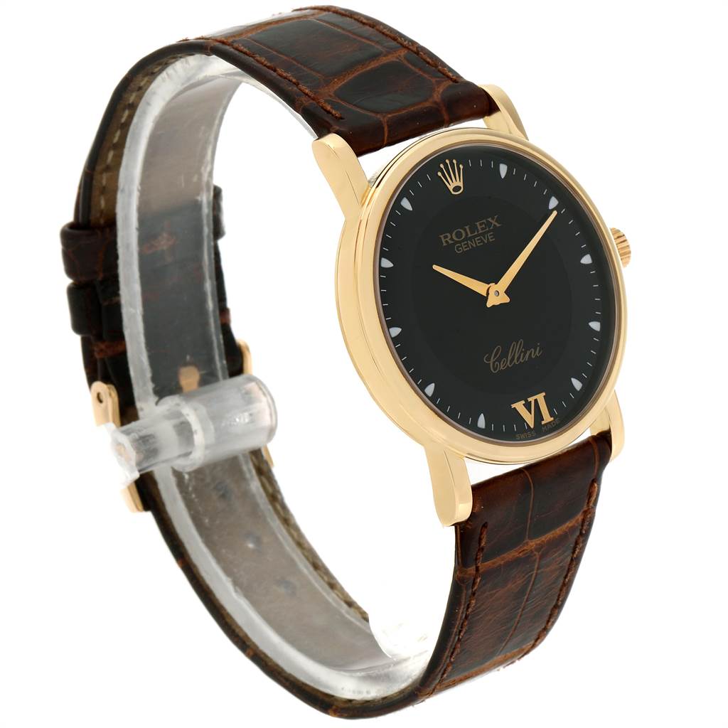 The image shows a side-angle view of a Rolex Cellini 5115 Men's Yellow Gold Black Dial 5115 Men's Yellow Gold Black Dial watch, highlighting its black dial, gold case, and brown leather strap.