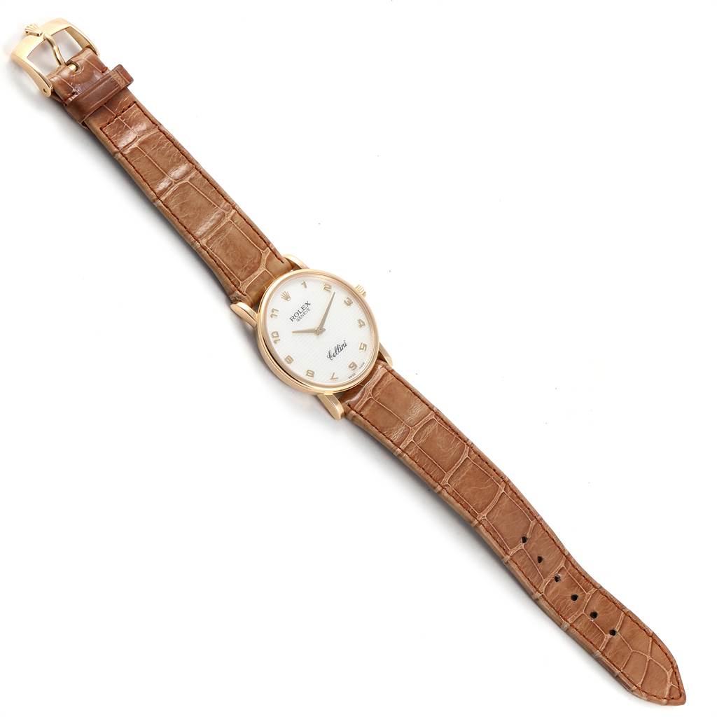 This Rolex Cellini 5115 Yellow Gold Mother of Pearl Dial 5115 Yellow Gold Mother of Pearl Dial watch is shown from a top-down angle, highlighting the face, strap, and clasp.