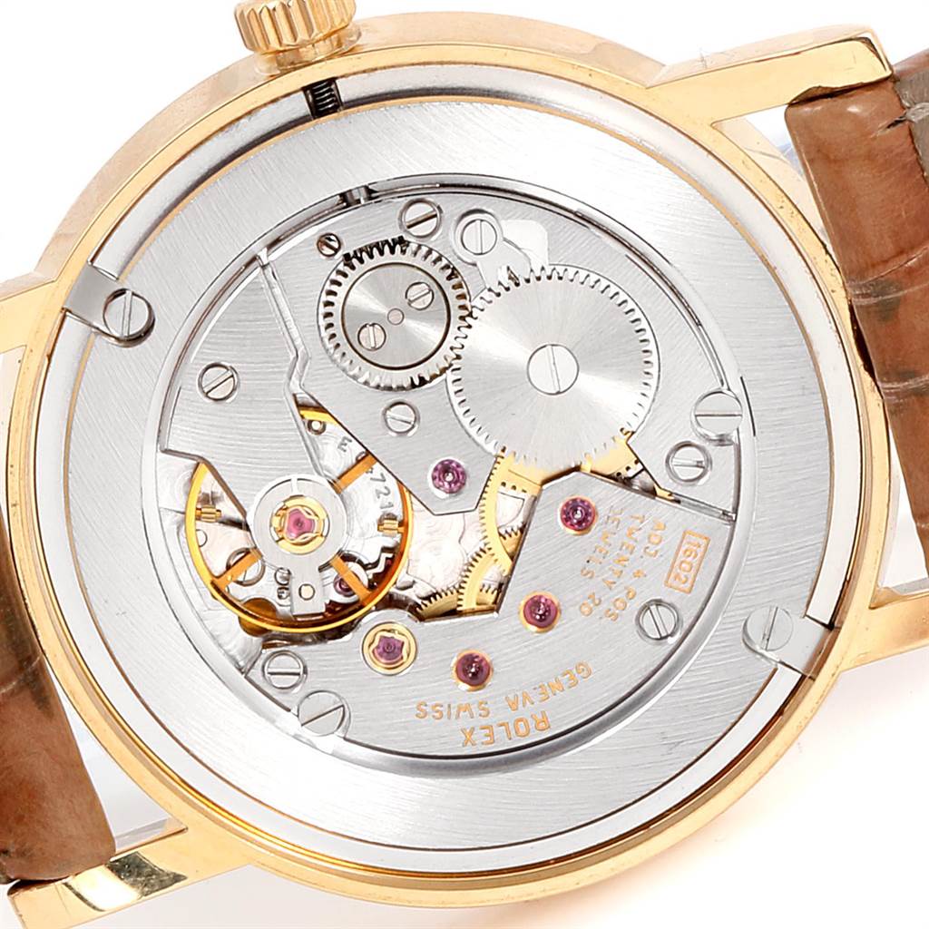 This image shows the back view of the Rolex Cellini 5115 Yellow Gold Mother of Pearl Dial 5115 Yellow Gold Mother of Pearl Dial watch, highlighting its internal mechanism.