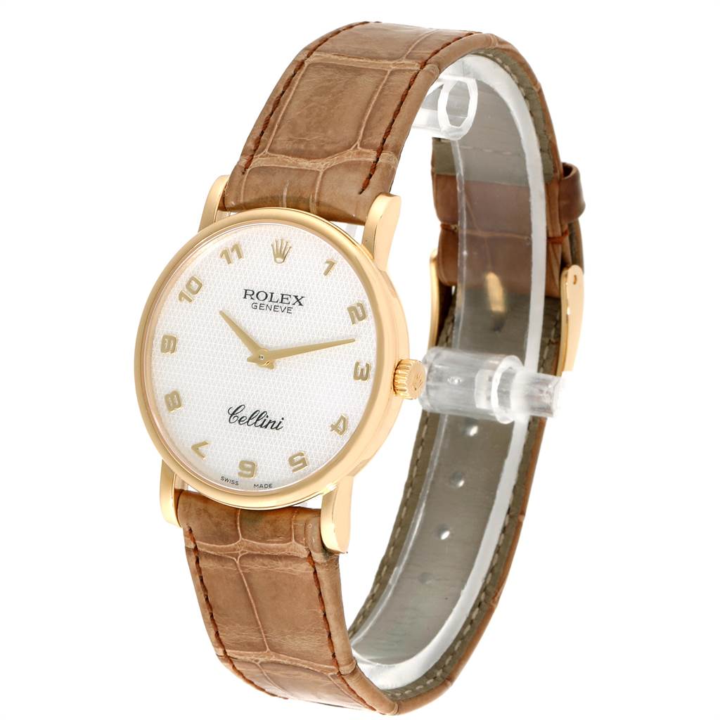 This image shows a Rolex Cellini 5115 Yellow Gold Mother of Pearl Dial 5115 Yellow Gold Mother of Pearl Dial watch at a slight angle, detailing its face, dial, and leather strap.