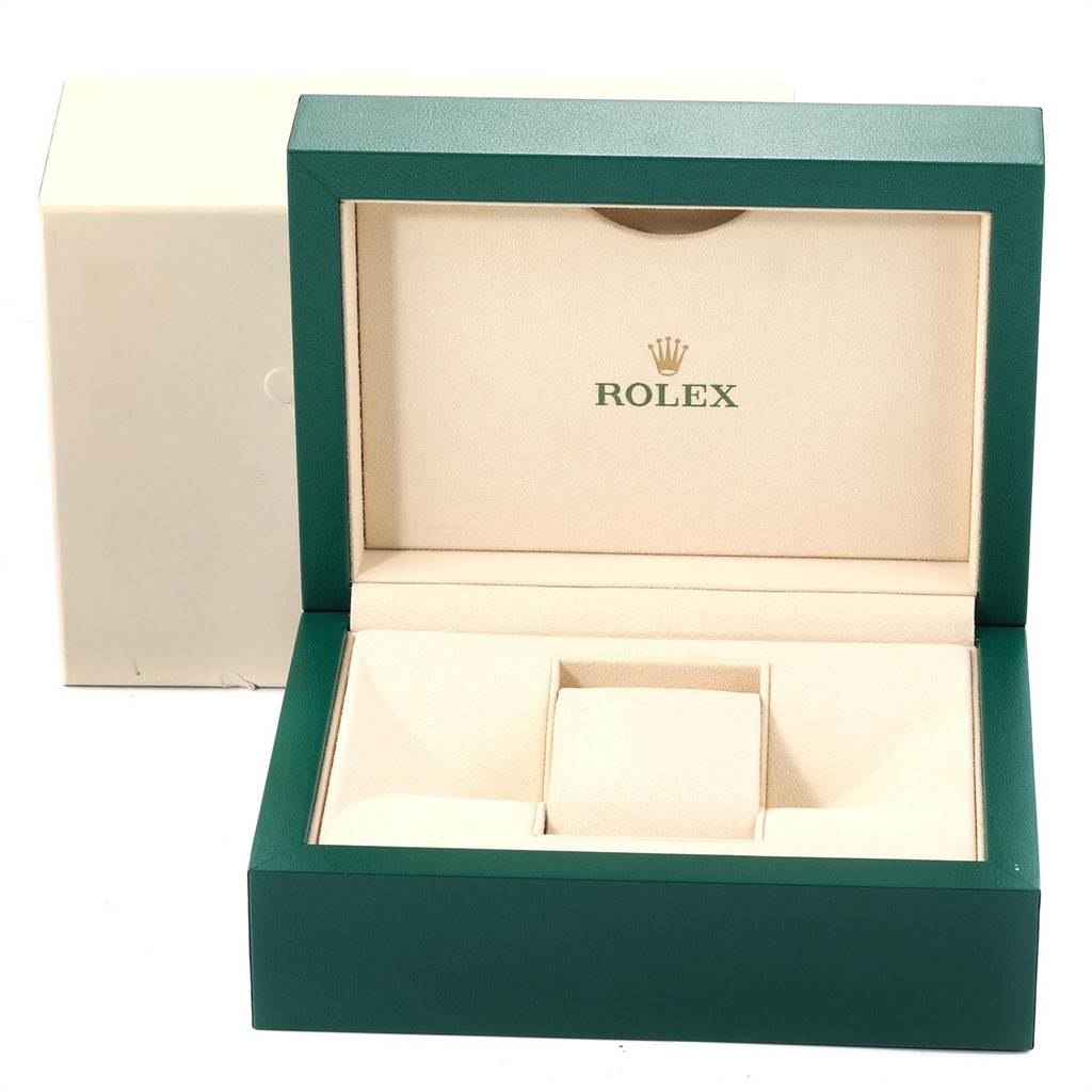The image shows an open green and cream Rolex watch box for the Cellini model, angled from the front.