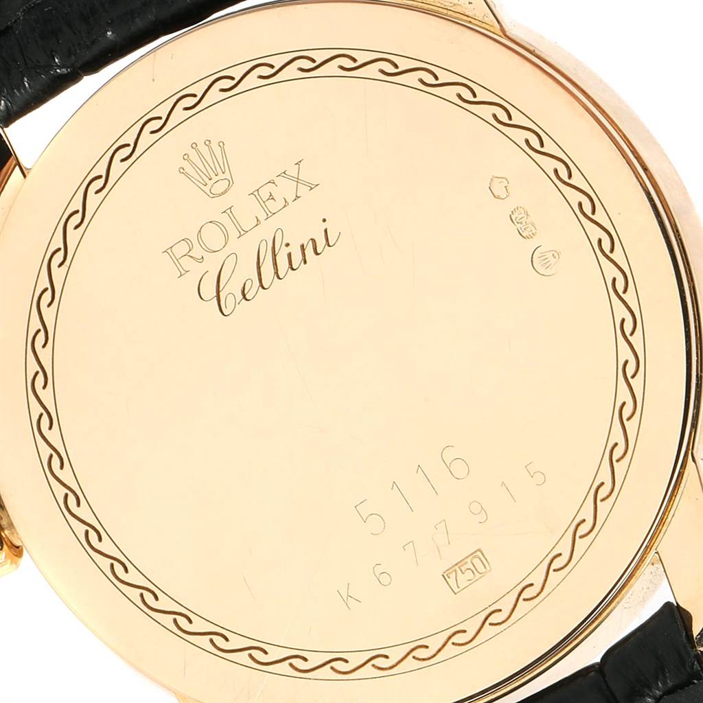This image shows the back case of a Rolex Cellini 5116 Men's Yellow Gold Champagne Dial 5116 Men's Yellow Gold Champagne Dial watch, displaying the model name, brand, and serial numbers.