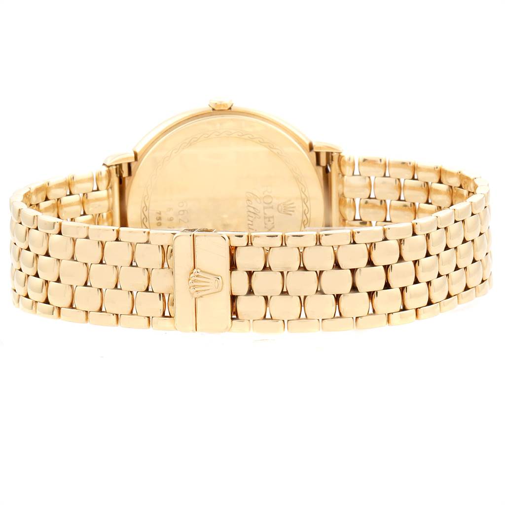 This image shows the back view of a Rolex Cellini 6623 Men's Yellow Gold White Dial 6623 Men's Yellow Gold White Dial watch, highlighting its gold bracelet and clasp.