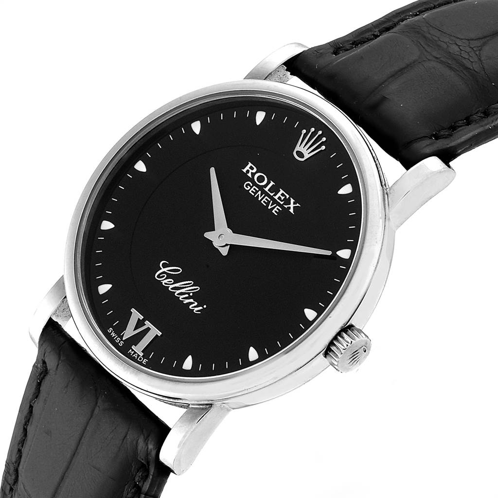 The Rolex Cellini 5115 Men
s White Gold Black Dial 5115 Men
s White Gold Black Dial watch is shown at a slight angled view, displaying the face, crown, and leather strap.
