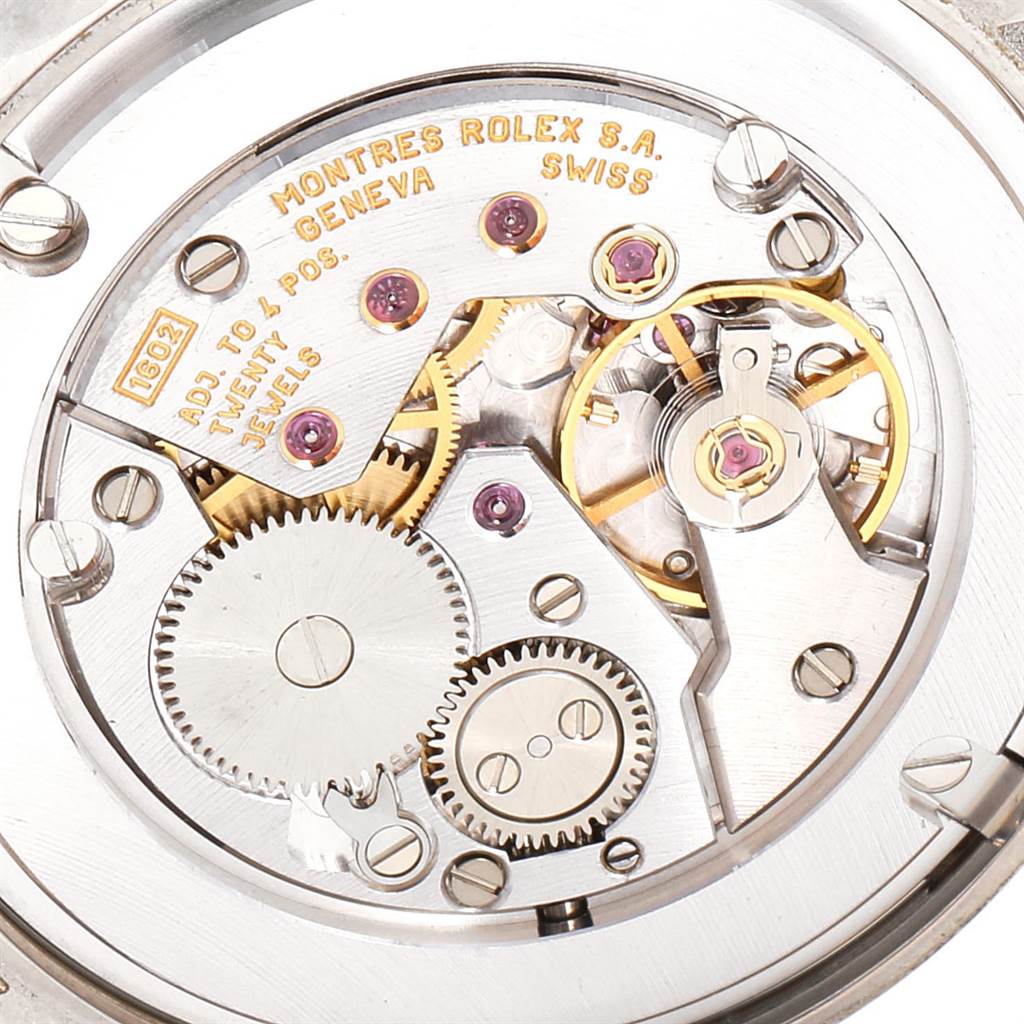 This image shows a close-up view of the movement mechanism of a Rolex Cellini 5115 Men
s White Gold Black Dial 5115 Men
s White Gold Black Dial watch.