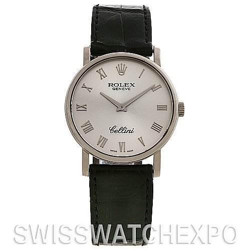 This Rolex Cellini 5115/9 White Gold Silver Dial 5115/9 White Gold Silver Dial watch is shown from a front angle, displaying its face, dial, and black leather strap.