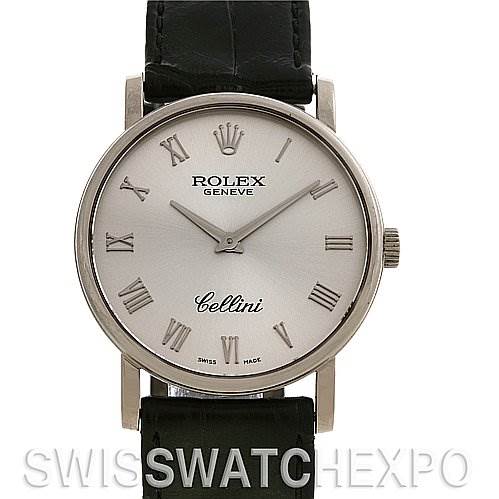 The image shows a front angle view of a Rolex Cellini 5115/9 White Gold Silver Dial 5115/9 White Gold Silver Dial watch, featuring its dial, hands, Roman numeral markers, and black leather strap.